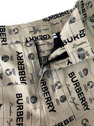 Burberry All Over Brand Name Print Beige Shorts