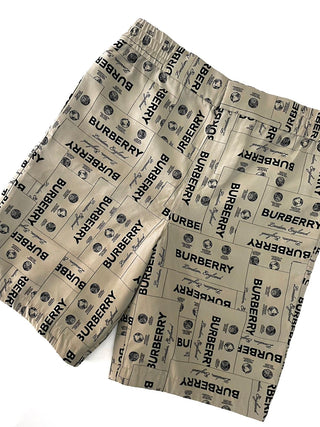 Burberry All Over Brand Name Print Beige Shorts