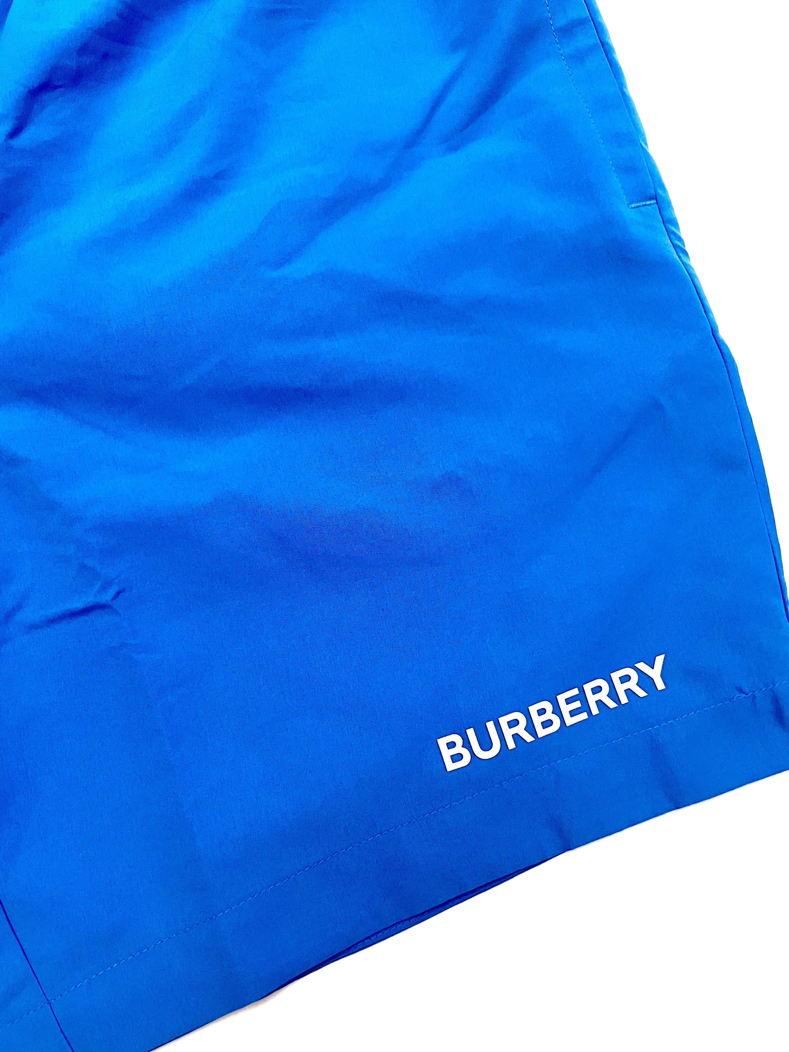 Burberry Blue Swim Shorts with White Brand Name Logo