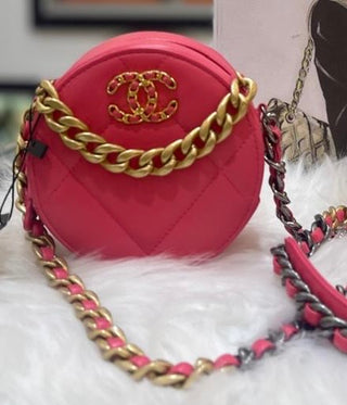 Chanel Pink Lambskin 19 Round Clutch with Chain